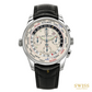 A  Girard Perregaux watch with a silver stainless steel case, a black leather strap, and a cream-colored dial featuring world city markings and chronograph subdials.