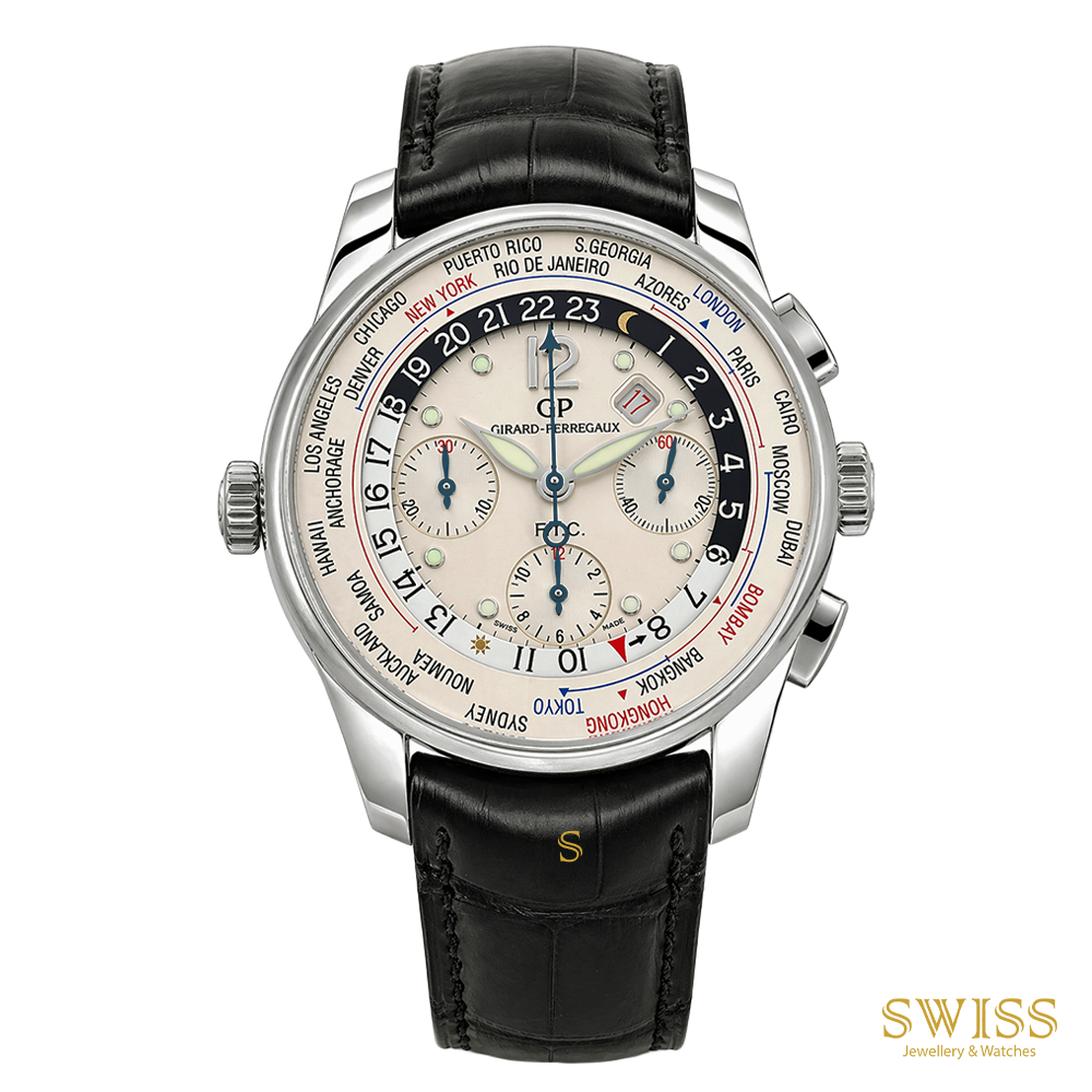 A  Girard Perregaux watch with a silver stainless steel case, a black leather strap, and a cream-colored dial featuring world city markings and chronograph subdials.